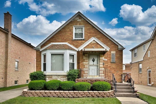 5010 N Merrimac Ave, Chicago, IL 60630 - view of front of house featuring brick siding