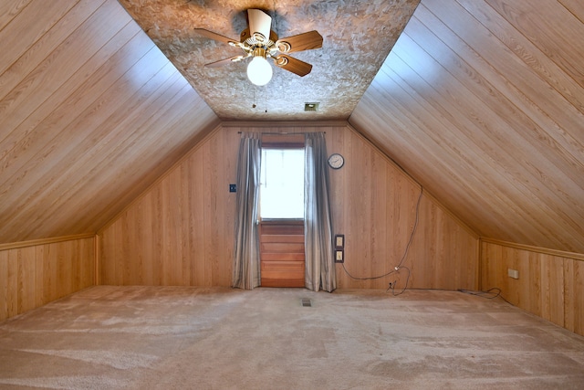 5010 N Merrimac Ave, Chicago, IL 60630 - bonus room with wood walls, carpet, lofted ceiling, and a ceiling fan