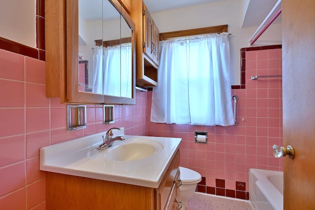 5010 N Merrimac Ave, Chicago, IL 60630 - bathroom with tile walls and vanity