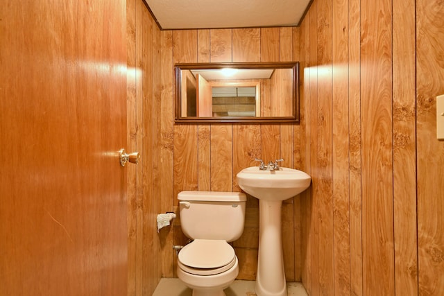 5010 N Merrimac Ave, Chicago, IL 60630 - bathroom featuring toilet and wooden walls