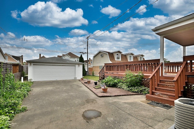 5010 N Merrimac Ave, Chicago, IL 60630 - exterior space featuring an outdoor structure, a garage, and a deck