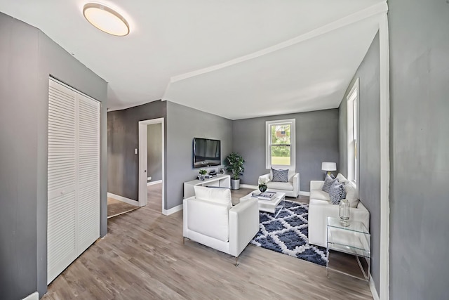 13834 Turner Ave, Robbins, IL 60472 - living room featuring baseboards and wood finished floors