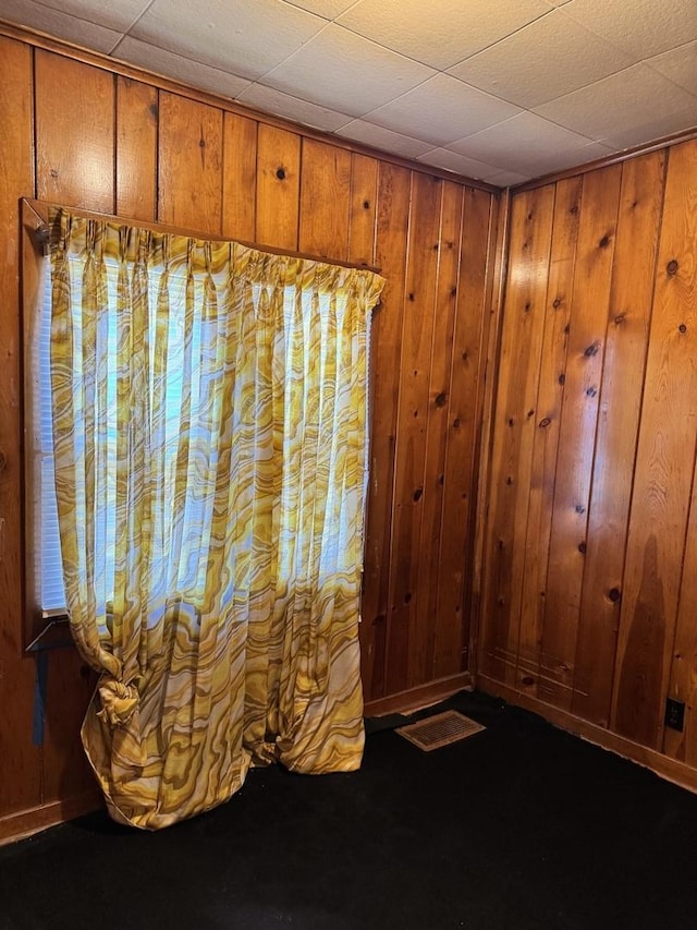 7022 S Claremont Ave, Chicago, IL 60636 - unfurnished room with wooden walls