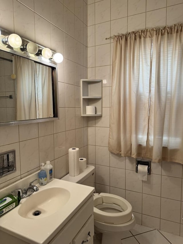 7022 S Claremont Ave, Chicago, IL 60636 - bathroom with tile walls, vanity, and backsplash