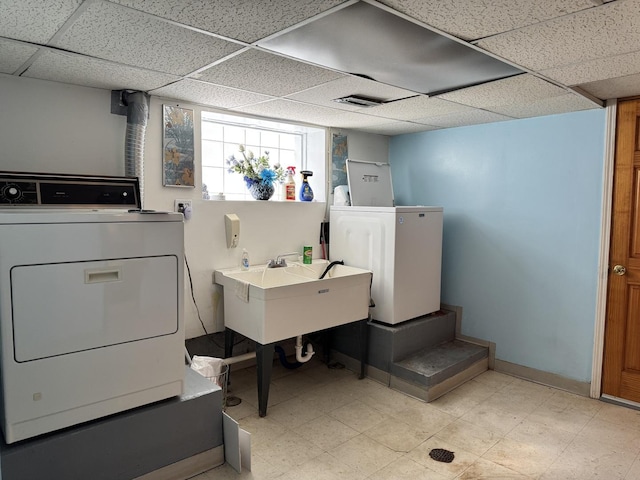 7022 S Claremont Ave, Chicago, IL 60636 - washroom featuring washing machine and clothes dryer and baseboards
