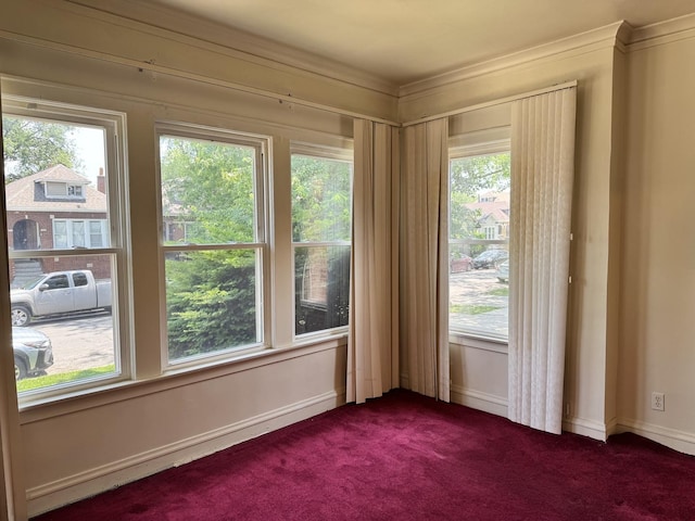 7022 S Claremont Ave, Chicago, IL 60636 - spare room featuring dark colored carpet and ornamental molding