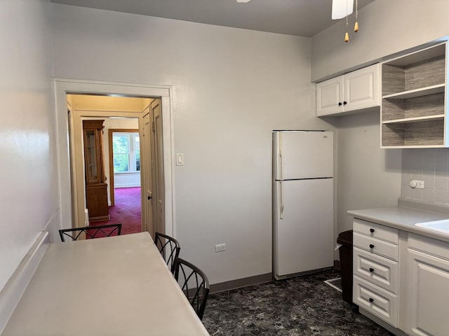 7022 S Claremont Ave, Chicago, IL 60636 - kitchen featuring freestanding refrigerator, white cabinets, open shelves, tasteful backsplash, and light countertops