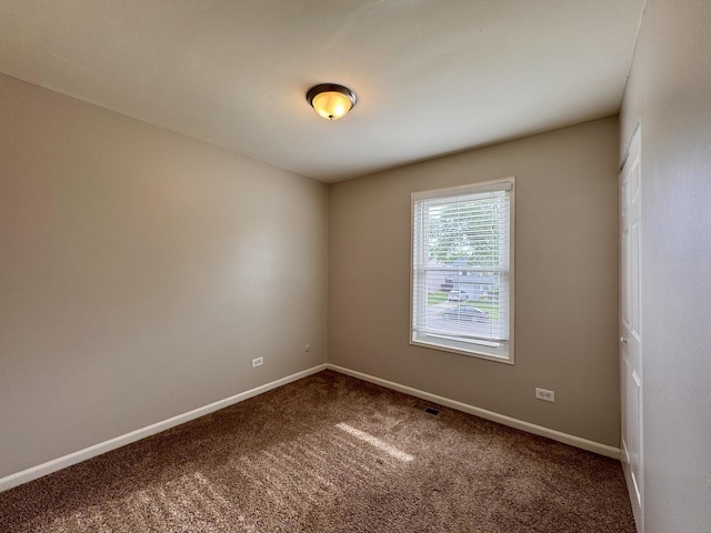 20552 S Frankfort Square Rd, Frankfort, IL 60423 - spare room featuring dark carpet and baseboards
