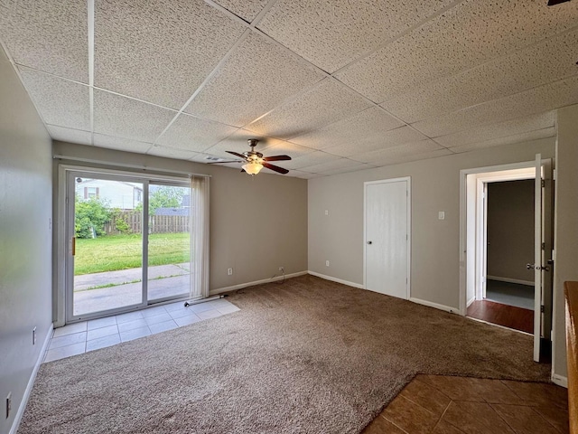 20552 S Frankfort Square Rd, Frankfort, IL 60423 - spare room featuring ceiling fan, carpet, tile patterned flooring, and a paneled ceiling