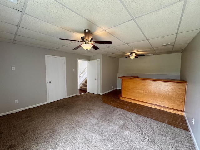 20552 S Frankfort Square Rd, Frankfort, IL 60423 - unfurnished living room with a ceiling fan, a paneled ceiling, carpet floors, stairway, and bar area