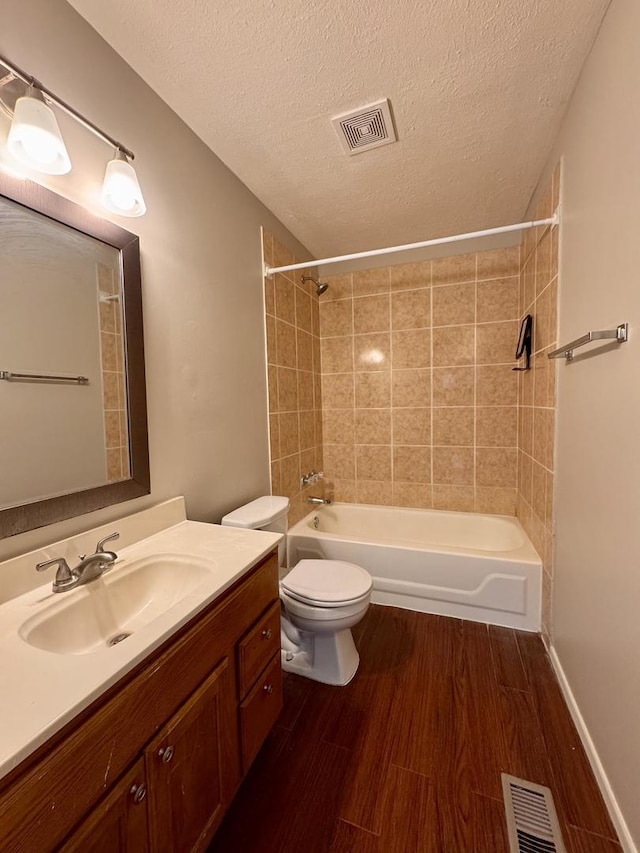 20552 S Frankfort Square Rd, Frankfort, IL 60423 - bathroom with shower / bath combination, vanity, wood finished floors, and a textured ceiling