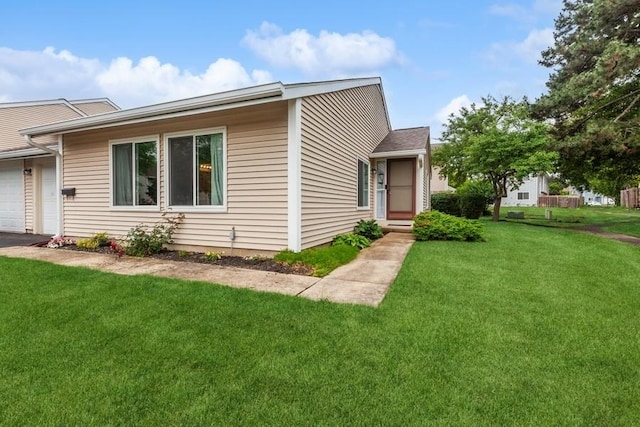 738 Colorado Ct, Carol Stream, IL 60188 - view of front of home featuring a front lawn and a garage