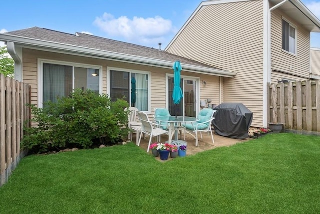 738 Colorado Ct, Carol Stream, IL 60188 - back of property featuring a fenced backyard, a patio area, and roof with shingles