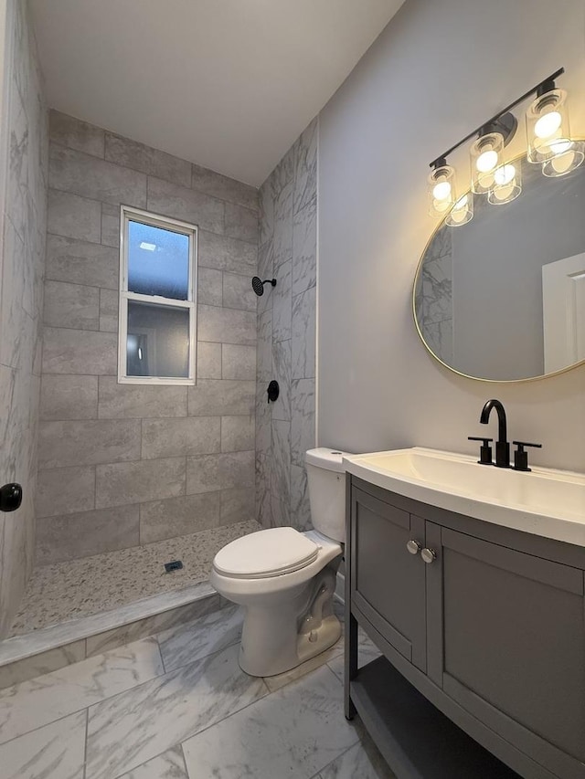 7130 S Morgan St, Chicago, IL 60621 - bathroom with vanity, marble look tile flooring, and tiled shower