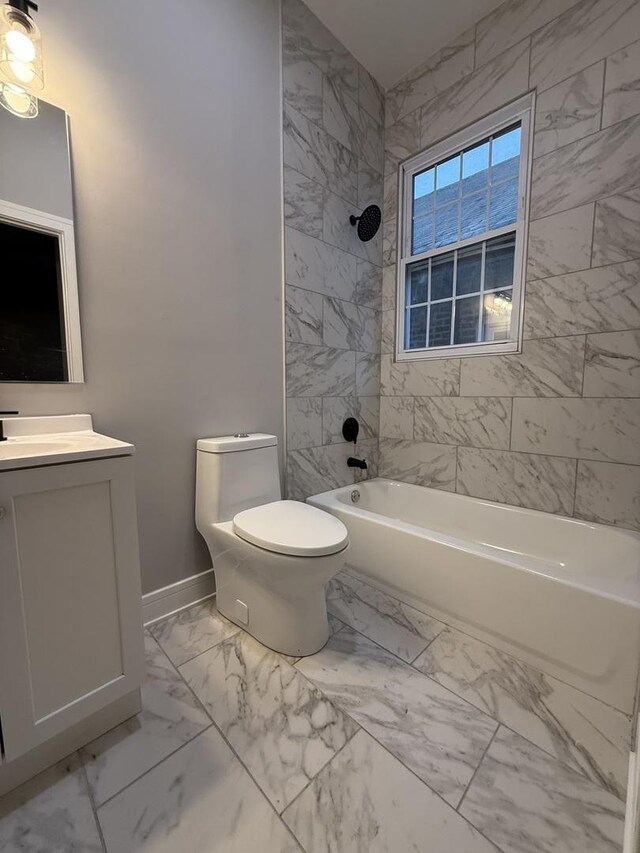 7130 S Morgan St, Chicago, IL 60621 - full bath with marble look tiles, vanity, and bathtub / shower combination