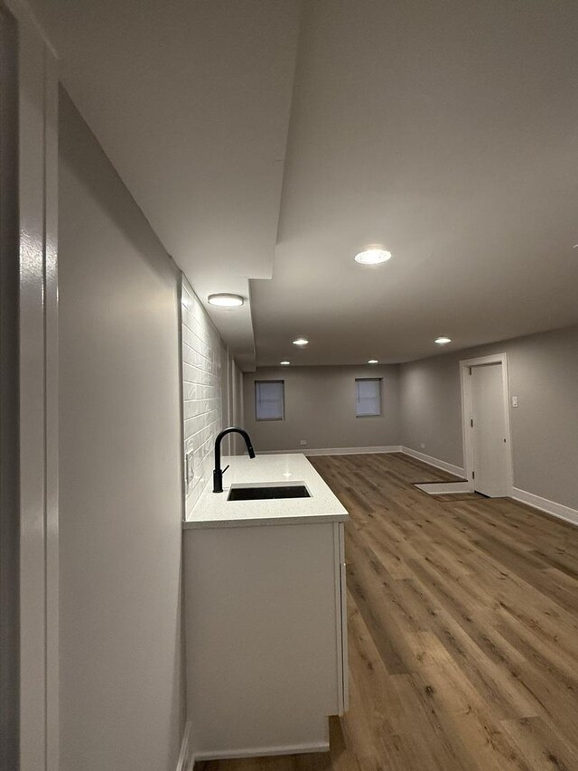 7130 S Morgan St, Chicago, IL 60621 - kitchen featuring wood finished floors, recessed lighting, and light countertops