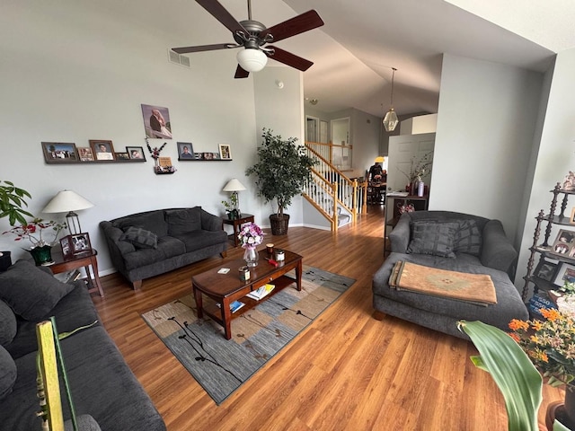 2311 White Eagle Dr, Plainfield, IL 60586 - living room with stairs, ceiling fan, wood finished floors, and lofted ceiling
