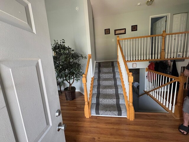 2311 White Eagle Dr, Plainfield, IL 60586 - stairs featuring wood finished floors and baseboards