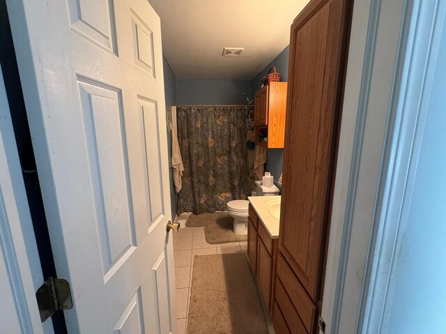 2311 White Eagle Dr, Plainfield, IL 60586 - full bath with vanity, tile patterned floors, and a shower with curtain