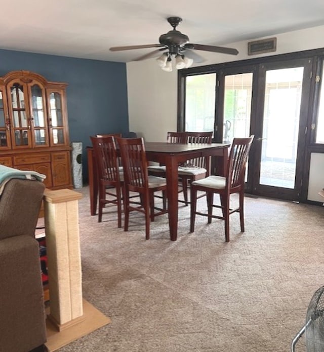 35 Douglas Ct, Hoffman Estates, IL 60169 - dining area with plenty of natural light, carpet, and a ceiling fan