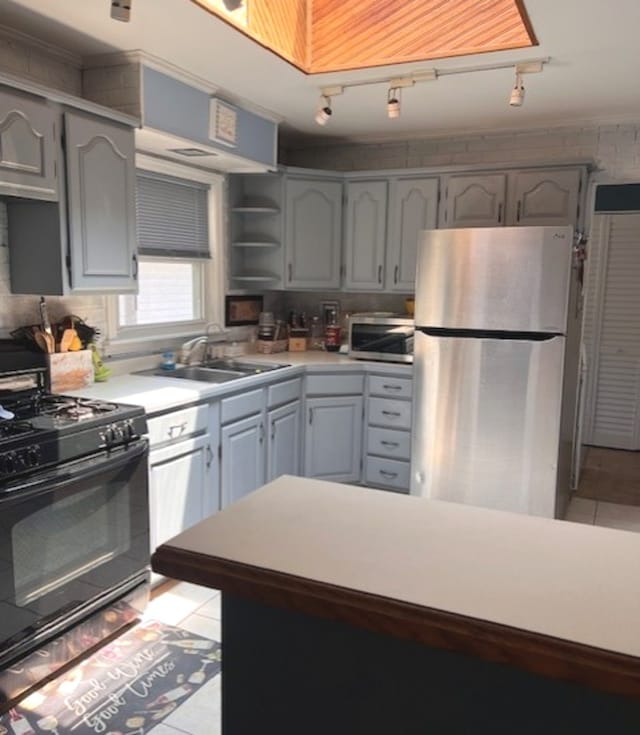 35 Douglas Ct, Hoffman Estates, IL 60169 - kitchen featuring appliances with stainless steel finishes, open shelves, light countertops, light tile patterned floors, and gray cabinets