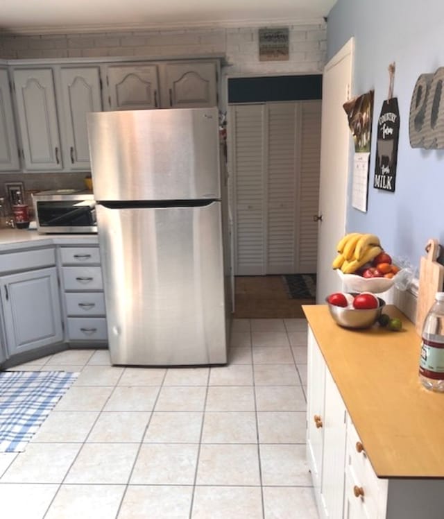 35 Douglas Ct, Hoffman Estates, IL 60169 - kitchen with stainless steel appliances, gray cabinets, and light tile patterned floors