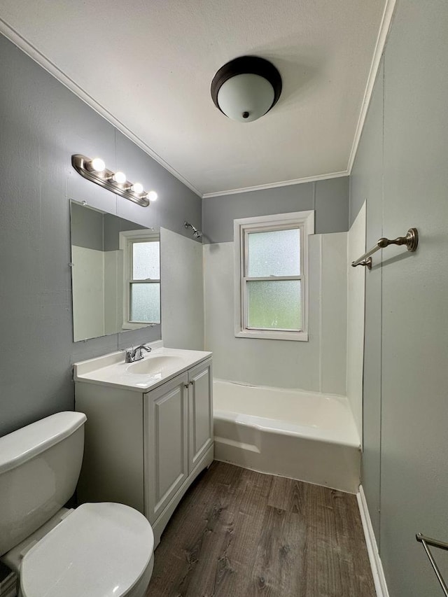 336 Marquette St, Park Forest, IL 60466 - bathroom featuring wood finished floors, vanity, washtub / shower combination, and ornamental molding