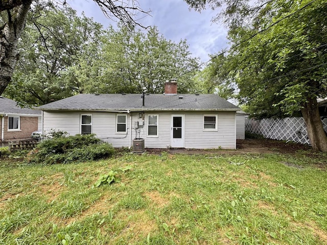336 Marquette St, Park Forest, IL 60466 - rear view of house with a chimney