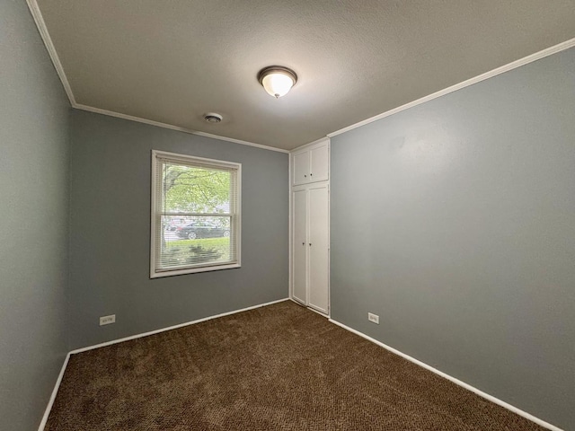 336 Marquette St, Park Forest, IL 60466 - spare room featuring crown molding and dark colored carpet