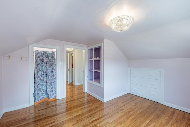 19749 Mokena St, Mokena, IL 60448 - additional living space with lofted ceiling and wood finished floors