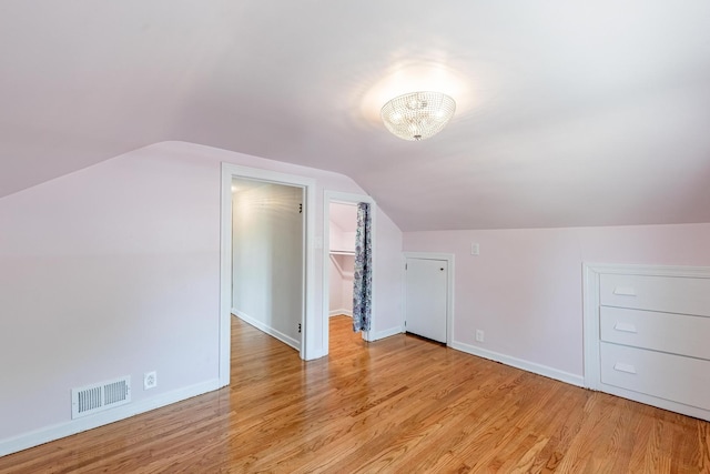19749 Mokena St, Mokena, IL 60448 - additional living space with light wood-style flooring and lofted ceiling