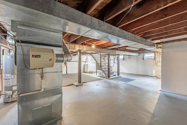 19749 Mokena St, Mokena, IL 60448 - below grade area featuring water heater, stairway, washer / clothes dryer, and heating unit