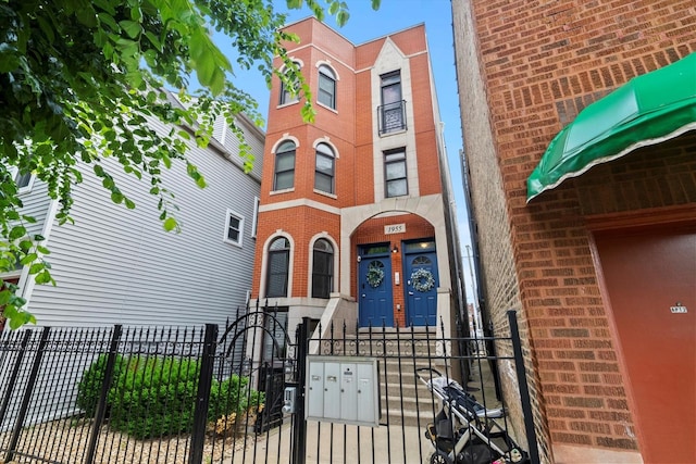1955 W Melrose St Unit 2, Chicago, IL 60657 - entrance to property featuring brick siding and a gate