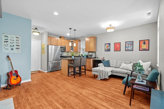 1955 W Melrose St Unit 2, Chicago, IL 60657 - living room with light wood-style floors and recessed lighting