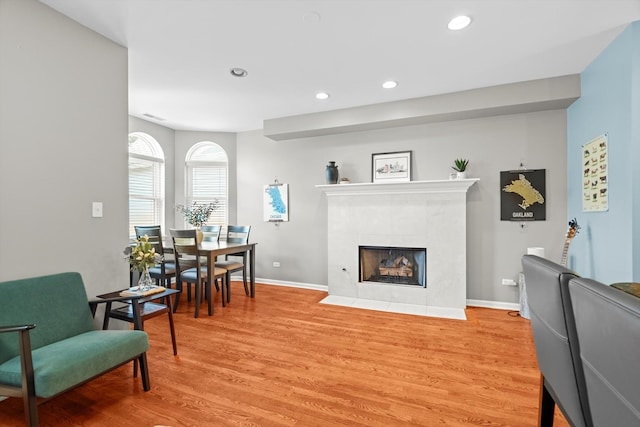1955 W Melrose St Unit 2, Chicago, IL 60657 - living area with light wood-style floors, recessed lighting, and a tiled fireplace