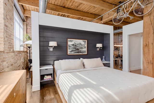 1017 W Washington Blvd Unit 2H, Chicago, IL 60607 - bedroom with a wood ceiling with exposed beams, wood finished floors, brick wall, and wood walls