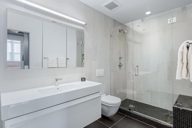 1017 W Washington Blvd Unit 2H, Chicago, IL 60607 - full bathroom featuring vanity, a shower stall, tile patterned flooring, and tile walls