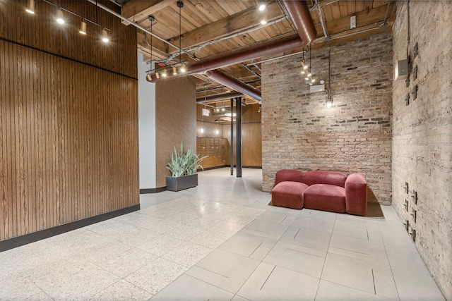 1017 W Washington Blvd Unit 2H, Chicago, IL 60607 - building lobby with a high ceiling and a wooden ceiling with exposed beams
