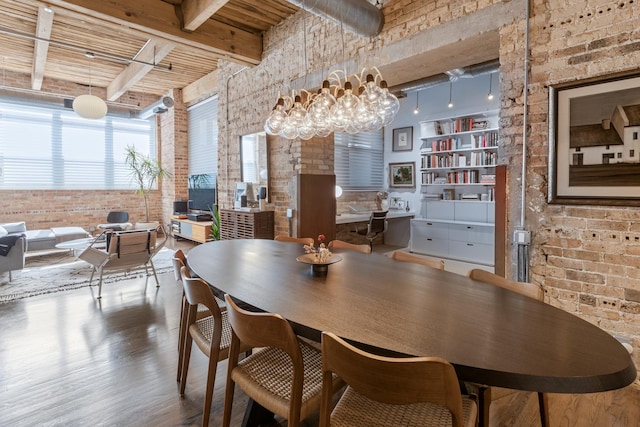 1017 W Washington Blvd Unit 2H, Chicago, IL 60607 - dining space with brick wall, wood finished floors, and beamed ceiling