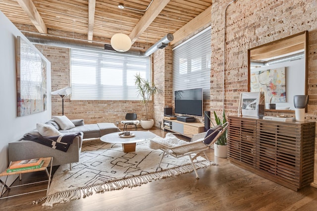 1017 W Washington Blvd Unit 2H, Chicago, IL 60607 - living area with brick wall, wood finished floors, and a wood ceiling with exposed beams