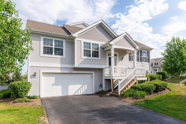 1113 Sapphire Ln, Pingree Grove, IL 60140 - view of front of home with a garage, asphalt driveway, and stairs