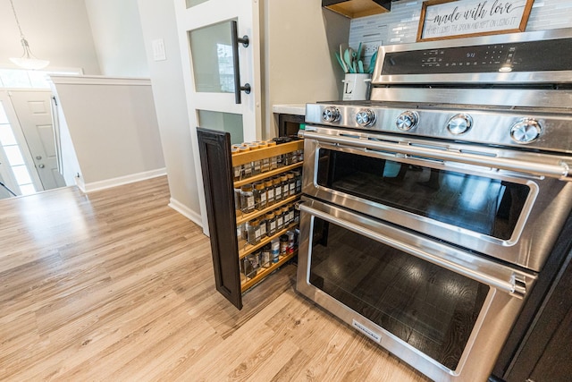 1113 Sapphire Ln, Pingree Grove, IL 60140 - kitchen featuring range with two ovens and light wood-type flooring