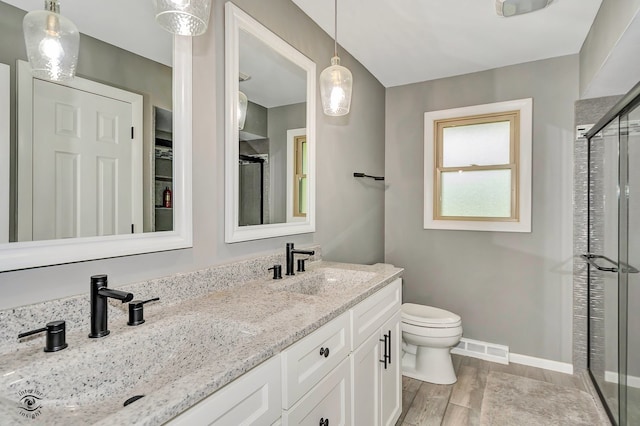 17242 Odell Ave, Tinley Park, IL 60477 - full bathroom with a stall shower, double vanity, and wood finished floors
