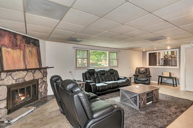 17242 Odell Ave, Tinley Park, IL 60477 - living room with track lighting, a stone fireplace, and a drop ceiling