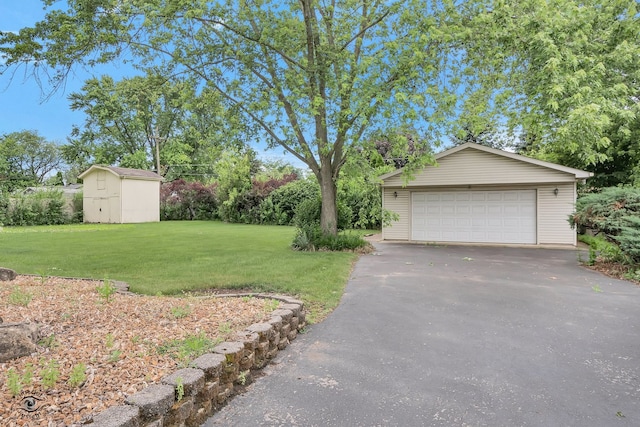 17242 Odell Ave, Tinley Park, IL 60477 - view of green lawn with a storage unit and a detached garage