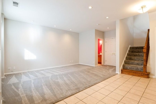 1855 Admiral Ct, Glenview, IL 60026 - spare room with light colored carpet, stairway, recessed lighting, and light tile patterned floors