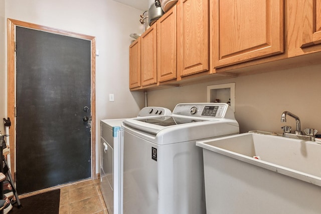 1611 Wintercrest Ln, Shorewood, IL 60404 - laundry area with separate washer and dryer, cabinet space, and light tile patterned floors