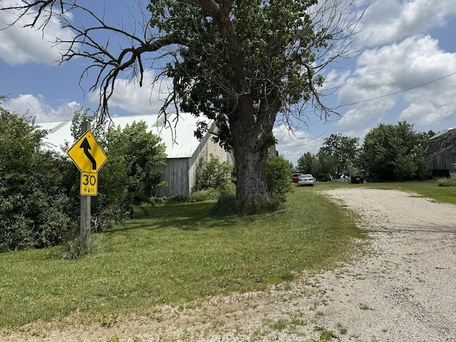 7915 N 4100 E Rd, Saybrook, IL 61770 - view of dirt / gravel road with traffic signs