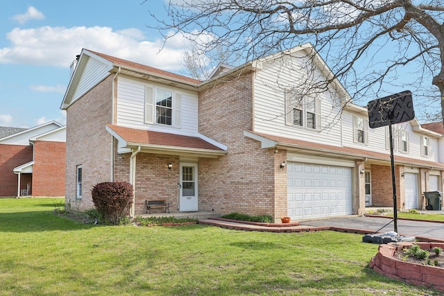1537 Anderson Trl, Zion, IL 60099 - view of front of home with an attached garage, brick siding, a front lawn, and driveway