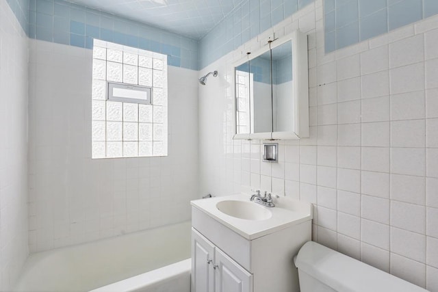 6000 S Mayfield Ave, Chicago, IL 60638 - full bath featuring tile walls, vanity, shower / bathtub combination, and tasteful backsplash